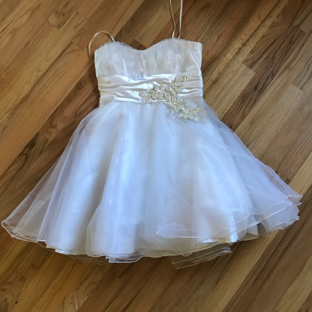 Above the knee white dress.